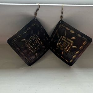 Bronze and gold metal earrings.